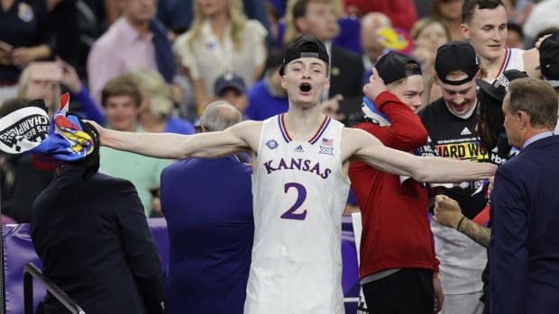 Kansas Jayhawks guard Christian Braun (2) reacts after defeating the North Carolina Tar Heels during the 2022 NCAA men's basketball tournament Final Four championship game at Caesars Superdome.